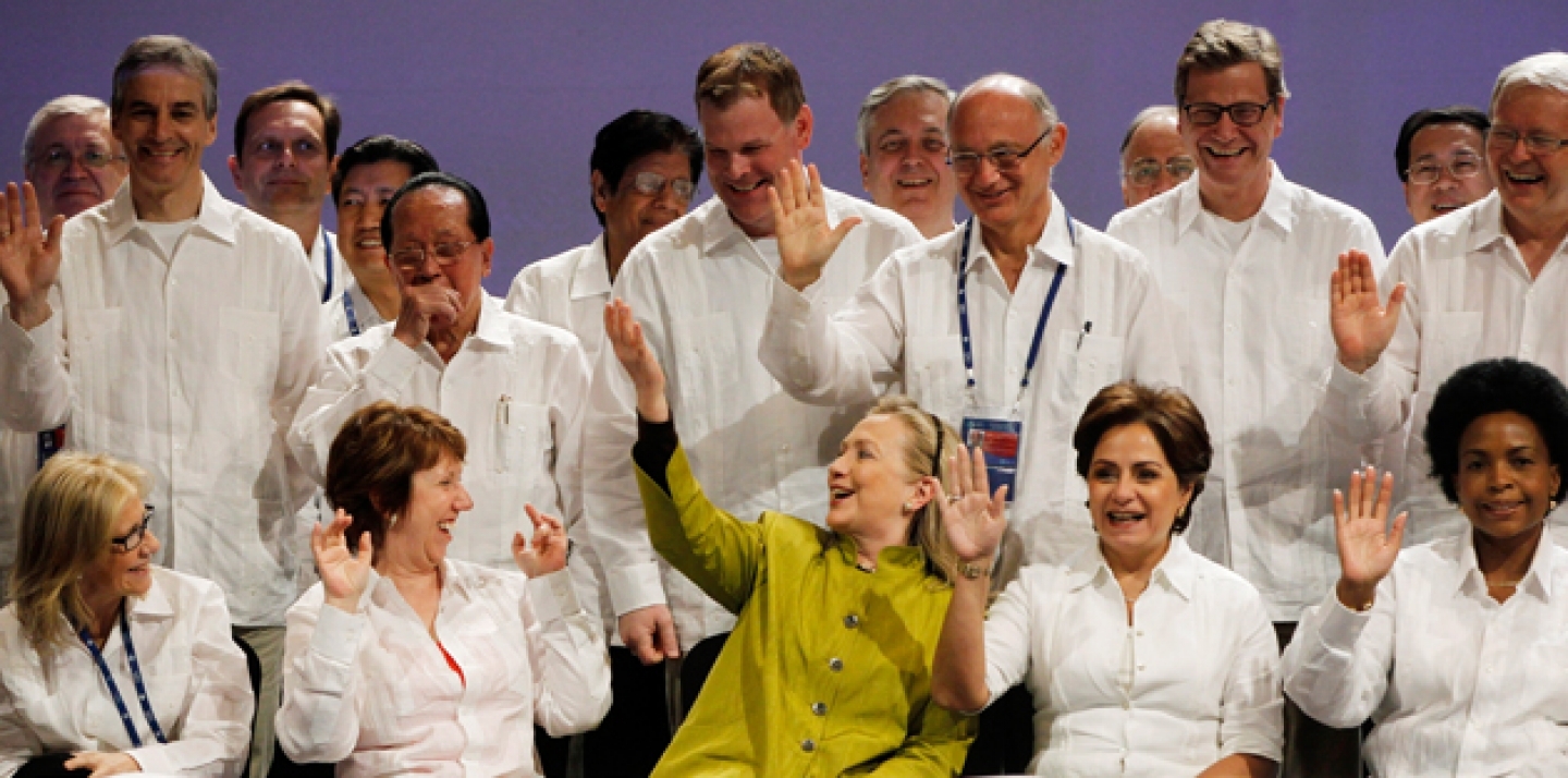US Secretary of State Hillary Clinton (centre) are other foreign ministers from G20 countries pose for a family photo in Los Cabos, Mexico, Monday, Feb. 20, 2012 (AP Photo/Charles Dharapak).