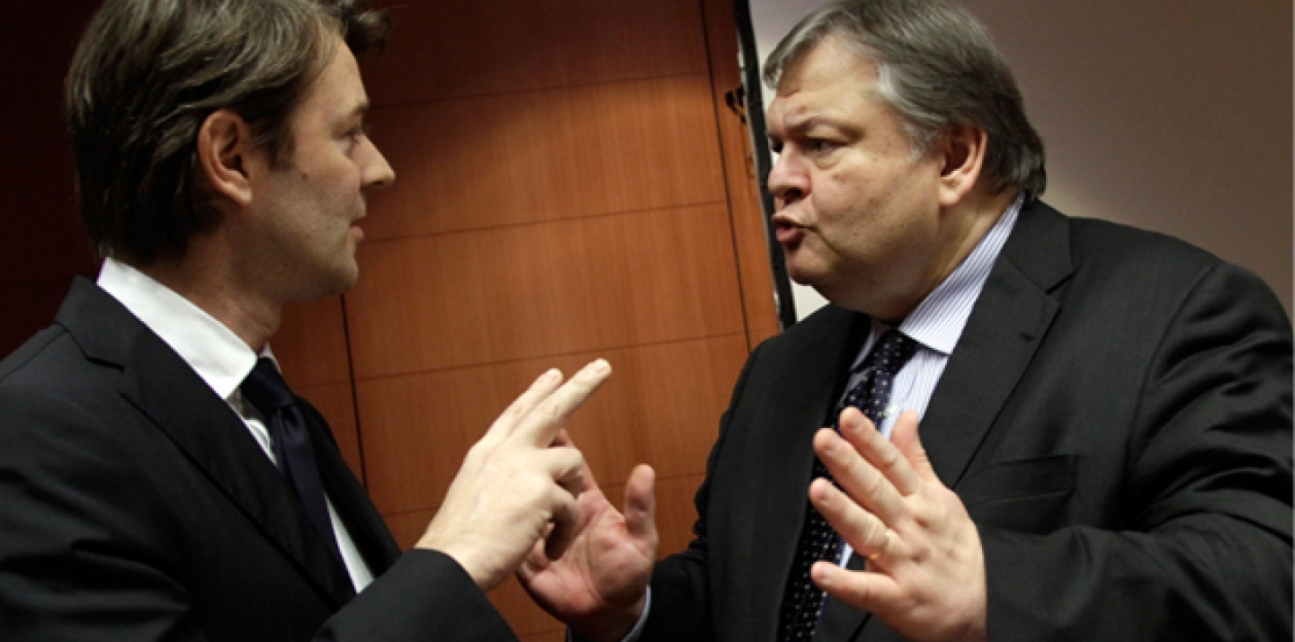Greek Finance Minister Evangelos Venizelos, right, speaks with French Finance Minister Francois Baroin during a meeting of EU finance ministers in Brussels on Jan. 23, 2012 (AP Photo/Virginia Mayo).