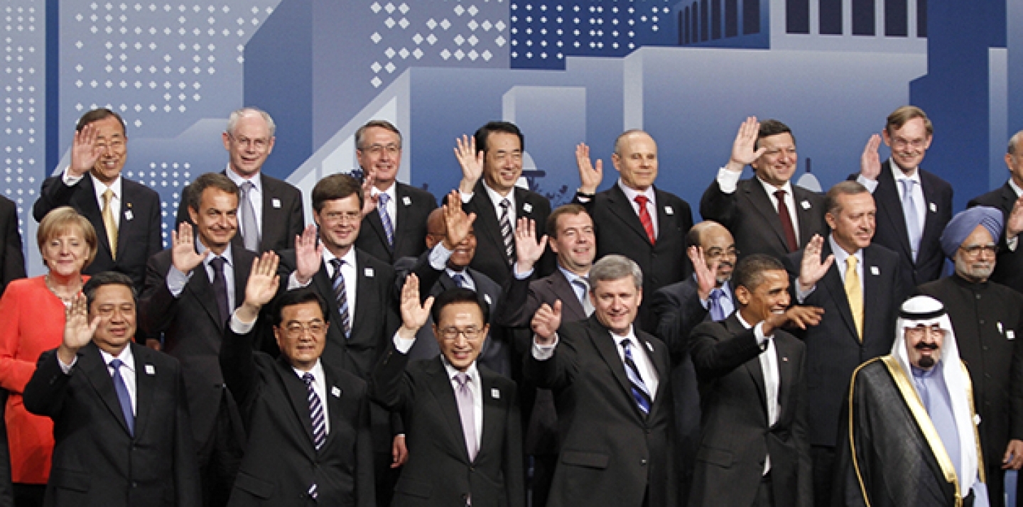 World leaders wave during a group photo at the G20 Summit in Toronto, 2010. (Lefteris Pitarakis, AP Images)