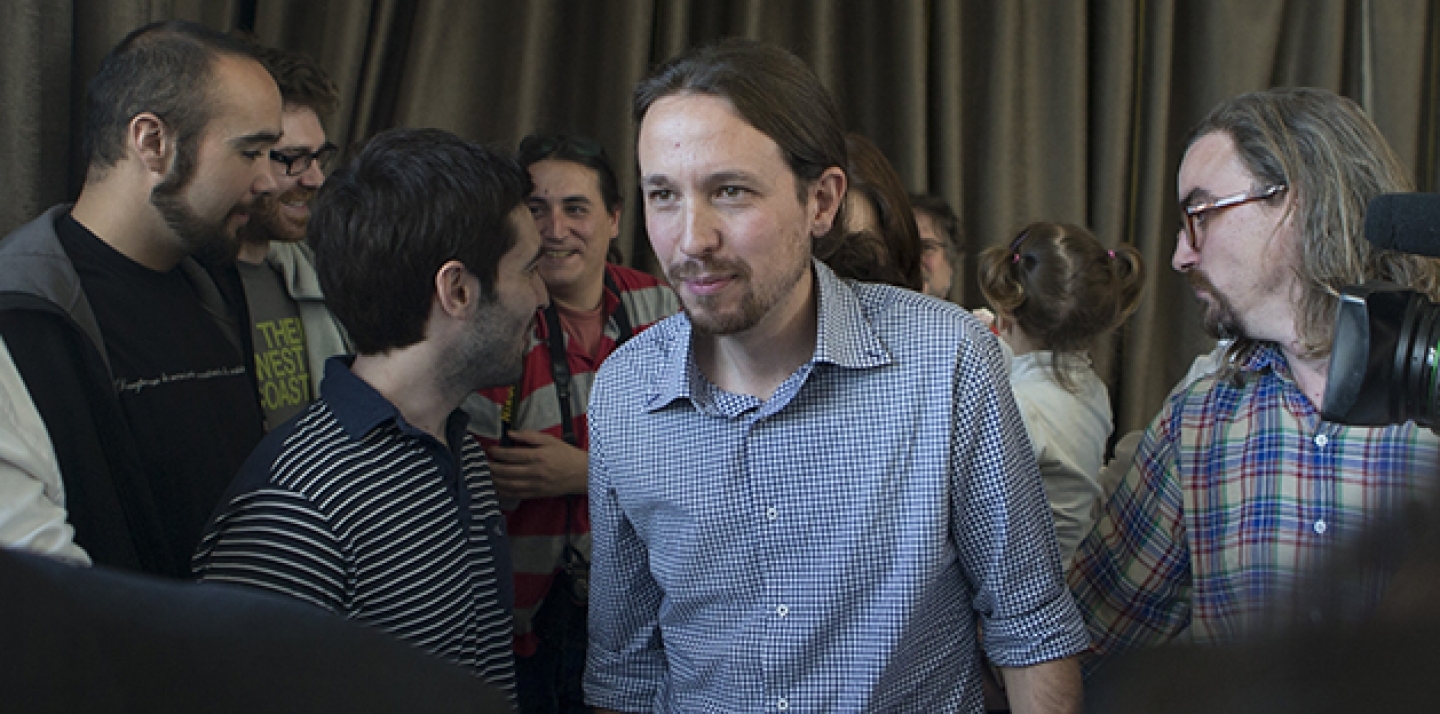 Pablo Iglesias, the leader of the leftist Podemos (We Can) party, centre, leaves a news conference in Madrid, Spain. (AP Photo/Paul White, File)