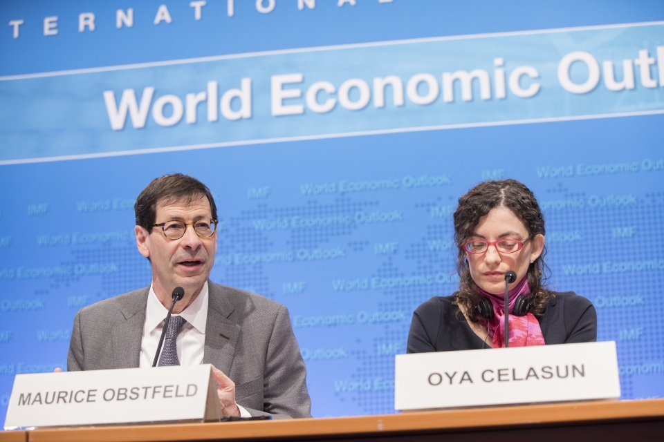 IMF Chief Economist Maurice Obstfeld and Research Division Chief Oya Celasun present the World Economic Outlook (IMF Staff/Stephen Jaffe)