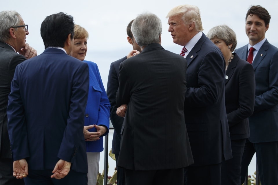 European Commission President Jean-Claude Juncker, Japan's Prime Minister Shinzo Abe, German Chancellor Angela Merkel, French President Emmanuel Macron, Italian Prime Minister Paolo Gentiloni, US President Donald Trump, British Prime Minister Theresa May and Canadian Prime Minister Justin Trudeau chat during a walking tour of the ancient Greek theatre of Taormina during G7 summit in Italy (AP Photo/Evan Vucci)