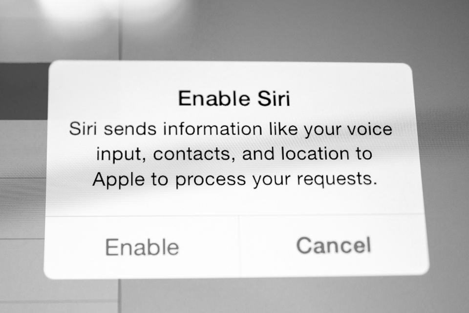 A growing portion of cross-border data flows are used to fuel AI applications such as Siri. Most users of products with AI elements are likely unaware that trade agreements govern AI. (Photo: Hadrian / Shutterstock.com)