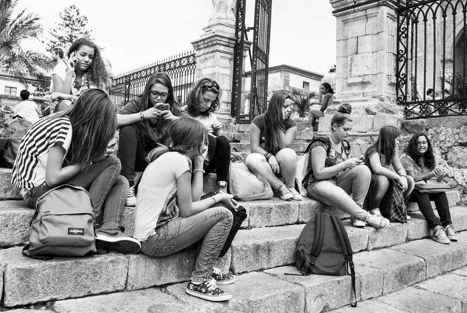 Smartphones foster 24/7 enmeshment and, because young people are overly connected to parents and peers, may hinder the process of individuation. (Photo: Aleksandar Todorovic / Shutterstock.com)