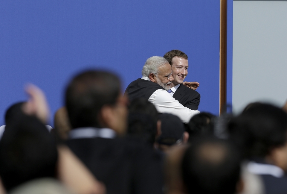 Facebook CEO Mark Zuckerberg, right, hugs Prime Minister of India Narendra Modi at Facebook in California in September, 2015. (AP Photo/Jeff Chiu)