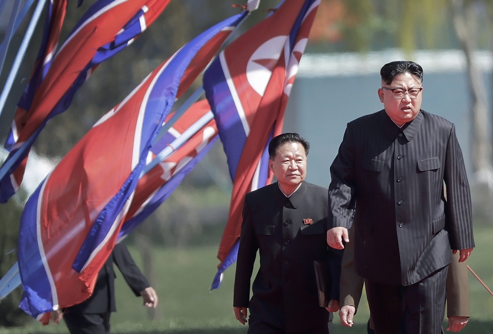 North Korean Kim Jong Un and Choe Ryong Hae arrive for the official opening of the Ryomyong residential area in April, 2017. (AP Photo/Wong Maye-E)