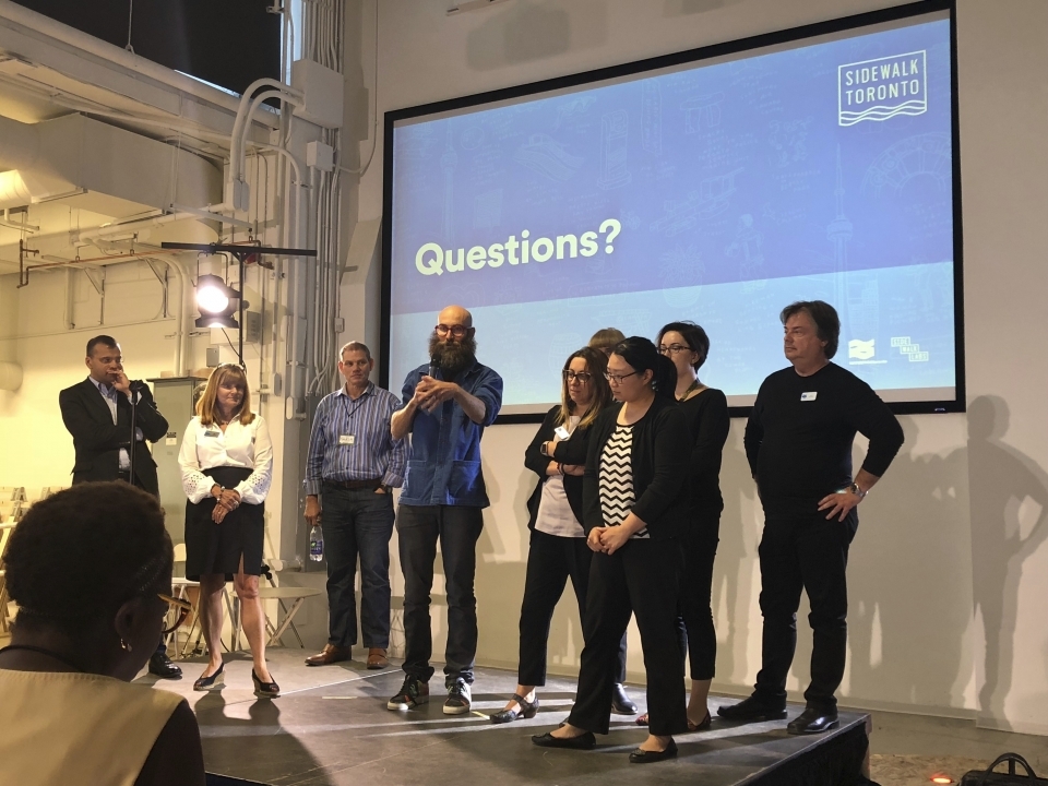 Jesse Shapins, director of public realm with Google affiliate Sidewalk Labs, takes questions at an August 15, 2018 public forum about a proposed development on Toronto's waterfront in Toronto, Canada. (AP Photo/Rob Gillies)