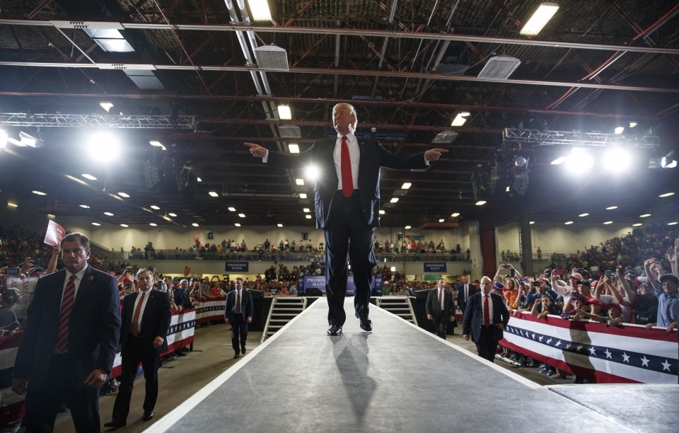 President Donald Trump reacts to the cheering crowd as he leaves a rally at on Thursday, July 5, 2018. (AP Photo/Carolyn Kaster)