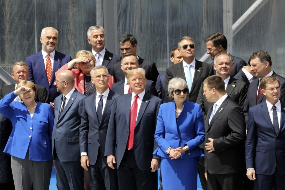Global leaders pose for a family picture ahead of the opening ceremony of the NATO summit in Brussels on July 11, 2018. (Ludovic Marin, Pool via AP)