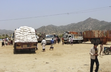World Food Programme (WFP) aid arrives in in Aslam, Hajjah, Yemen. The programme recently accused the government of redirecting aid to fund the war and insisted that aid recipients participate in a biometric identity-tracking system, sparking a data governance standoff. (AP Photo/Hammadi Issa)