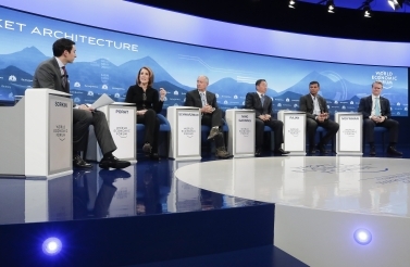 Andrew R. Sorkin moderates a panel titled "Shaping a New Market Architecture" at the World Economic Forum in Davos, Switzerland, on January 22, 2019. (AP Photo/Markus Schreiber)