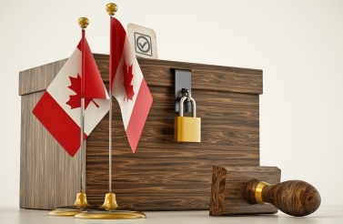 locked ballot box with Canadian flags