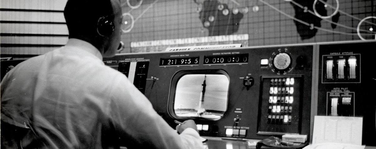 Astronaut Alan B. Shepard monitoring the launch of Mercury-Redstone 4 at the CAPCOM console in Mercury Control Center. (NASA Photo)