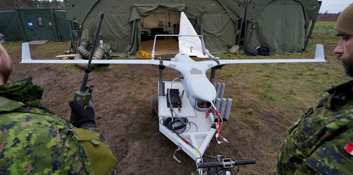 Canadian Armed Forces members of the Artillery unit of NATO Multinational Brigade Latvia work on an RQ-21A Blackjack drone as part of a major field exercise in Latvia. (Janis Laizans/REUTERS)