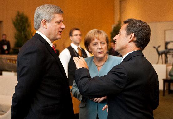 Prime Minister Stephen Harper chats with Angela Merkel, Chancellor of Germany, and Nicolas Sarkozy, President of France at the G-8.JPG