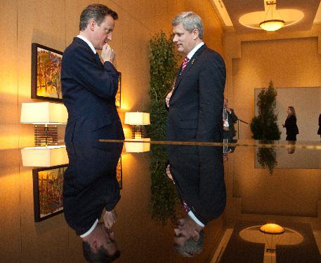 Prime Minister Stephen Harper discusses the Muskoka Initiative on Maternal, Newborn and Child Health with David Cameron.JPG