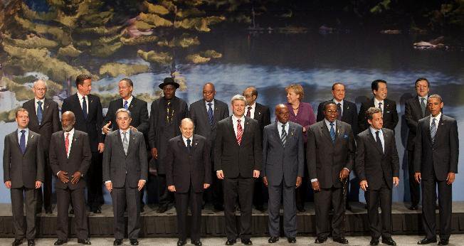 The leaders of the G-8 and Outreach countries pose for a family photograph.JPG